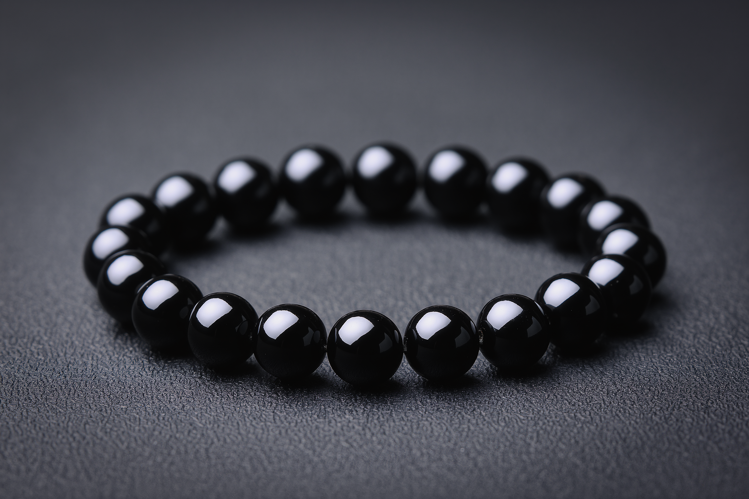 Glossy black obsidian round bead bracelet
